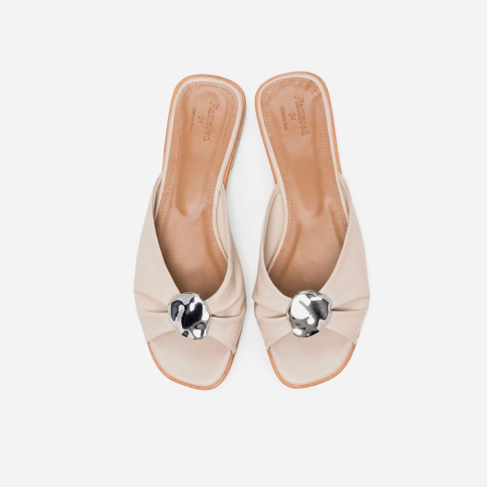 Flattered Beige Knot-Front Slide Sandals with Silver Disc